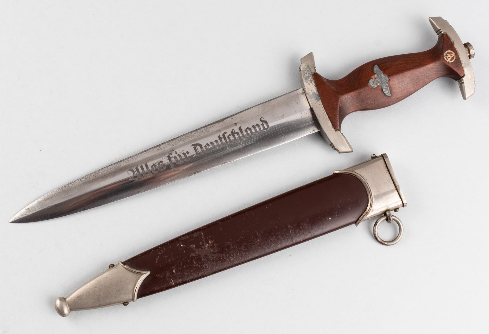 CARL EICKHORN SA DAGGER RZM MARKED M7/66 1941: Carl Eickhorn SA dagger marked RZM M7/66 1941. The dagger appears untouched with honest wear. The grip eagle appears to be zinc and may have been replaced long ago. The pommel shows wear and is