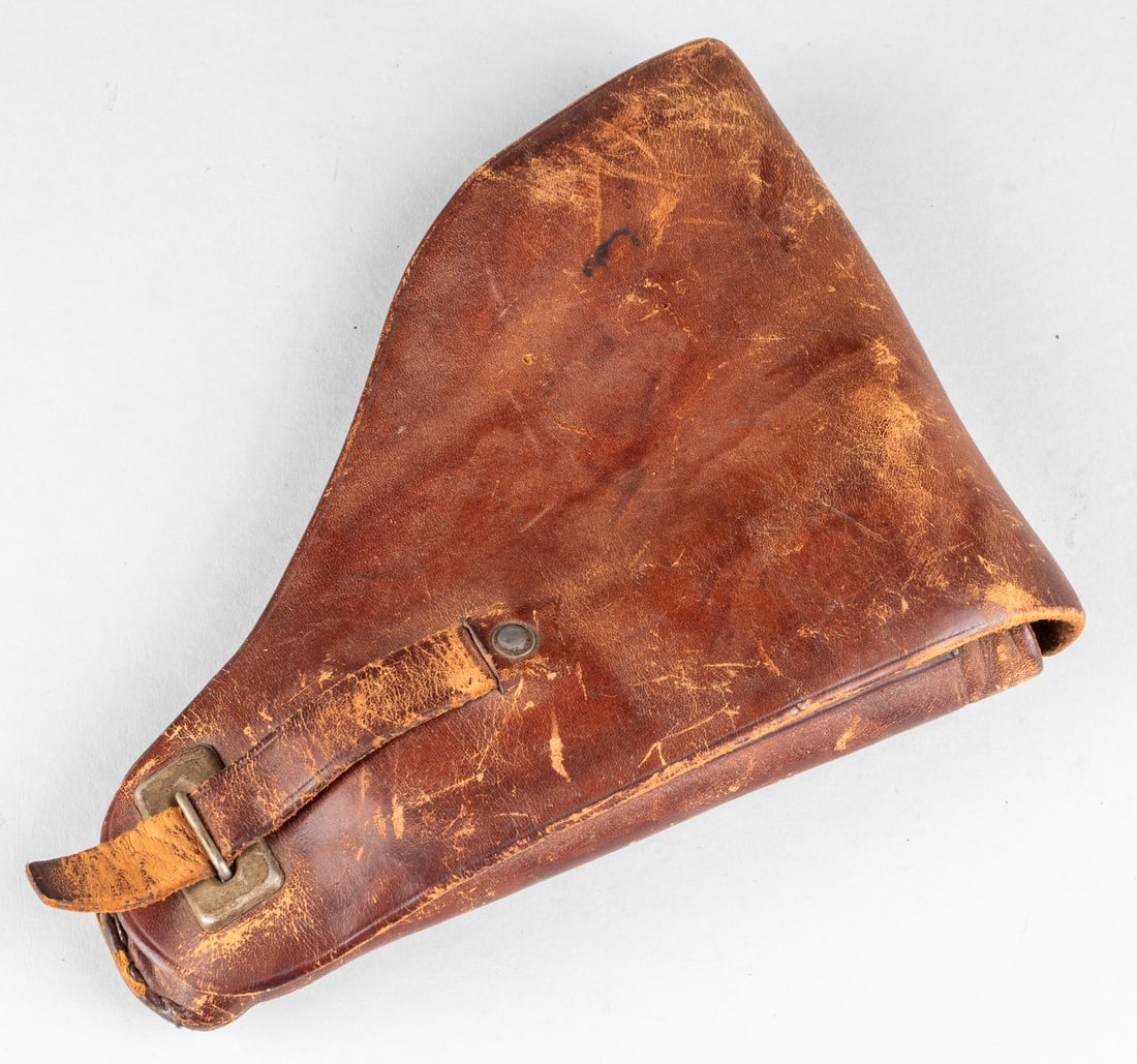 FRENCH MLE 1935A PISTOL HOLSTER VETERAN BRINGBACK: French MLE 1935A pistol holster, U.S. veteran bringback from the ETO. Tagged in black ink on inside the cover flap 'T/5 Master Page Line 33241660 Capitaine Marled E.M.F.T..
