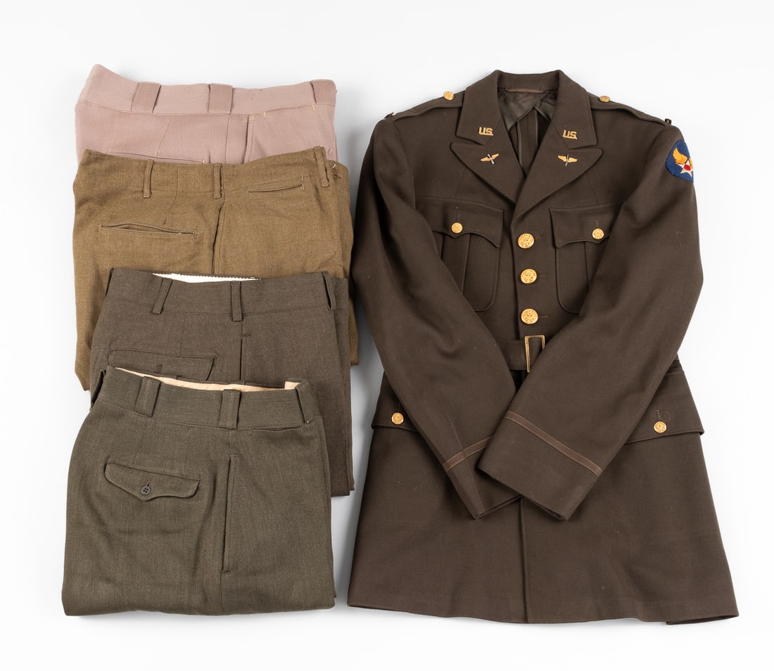 WWII AMERICAN ARMY UNIFORM COLLECTION: WWII American Army uniform collection, including: Army Air Corps Warrant Officer's jacket, Hap Arnold AAF shoulder insignia patch, two U.S. collar pins, two AAF Prop and Wings collar pins, two AAF Fli