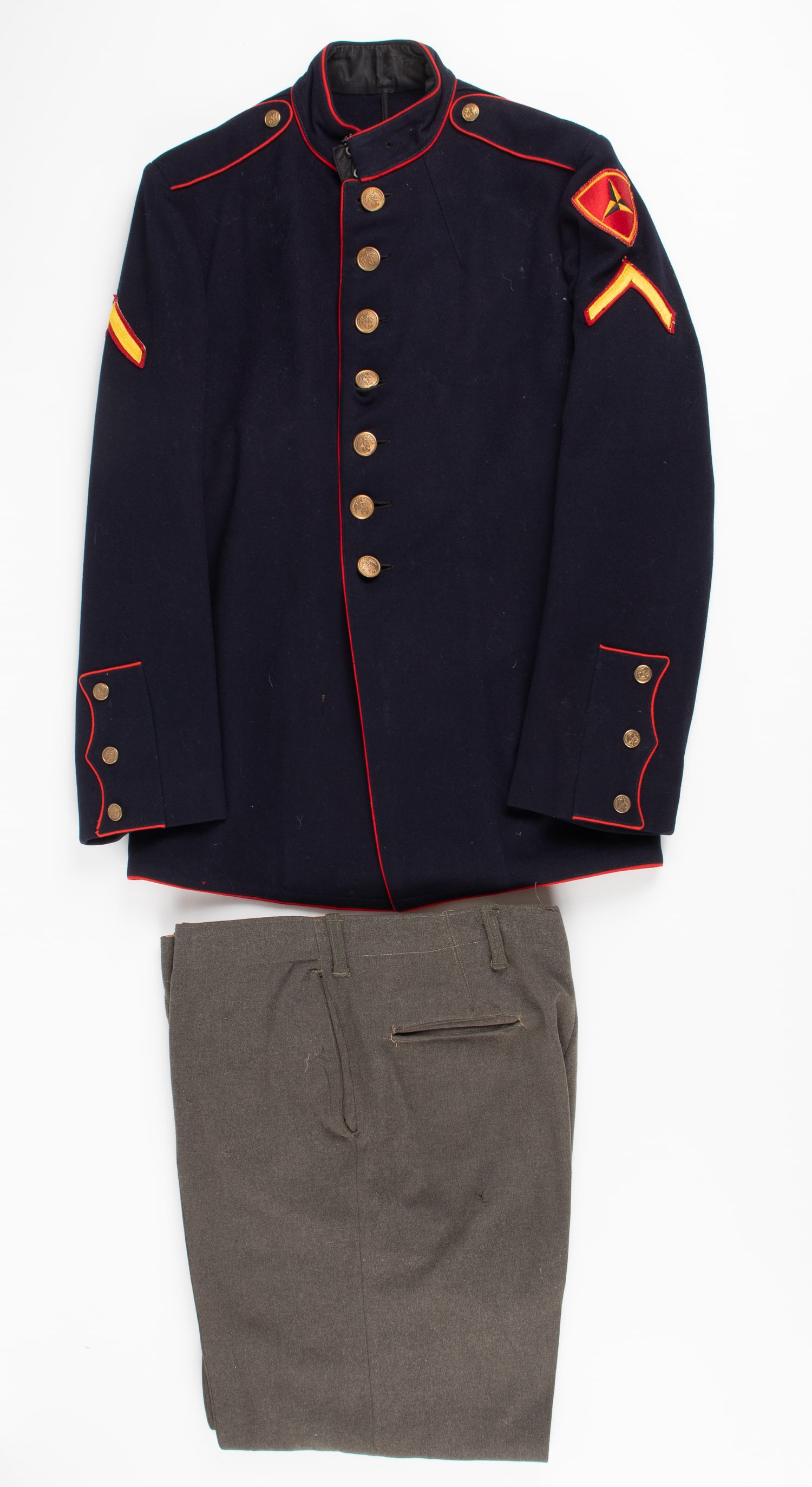 WWII USMC GROUPING NAMED UNIFORM WITH PHOTO ALBUM: WWII US Marine Corps uniform and small photo album belonging to Harvey E. Thompson, a Private First Class of the USMC. His Dress Blue tunic with a USAMM 3rd Marine Division shoulder sleeve insignia,