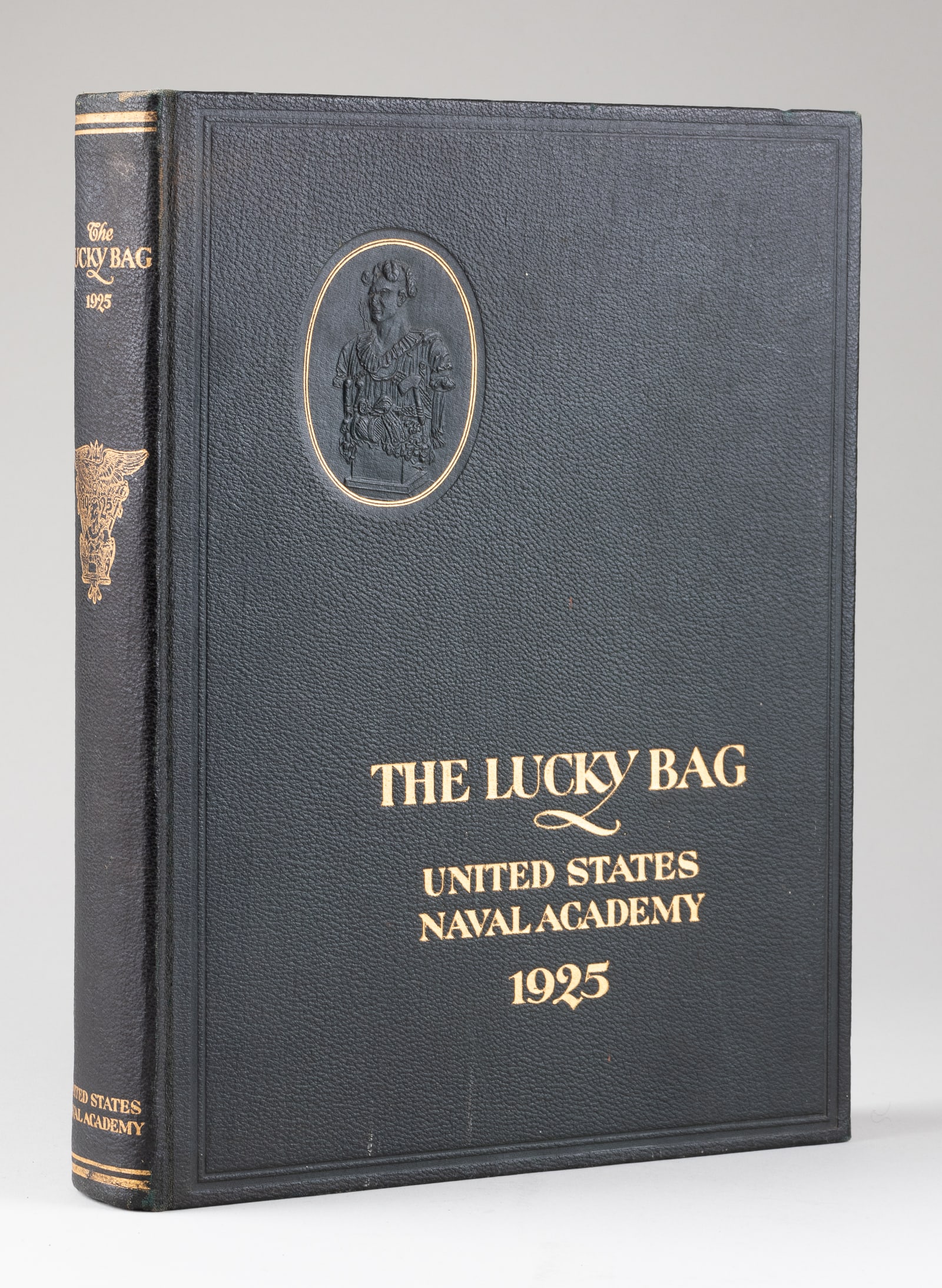 1925 US NAVAL ACADEMY LUCKY BAG YEARBOOK: 1925 yearbook for the United States Naval Academy at Annapolis, Maryland, titled 'The Lucky Bag.' 271 pages of students with their pictures and a description of them. 15 of the graduates died in