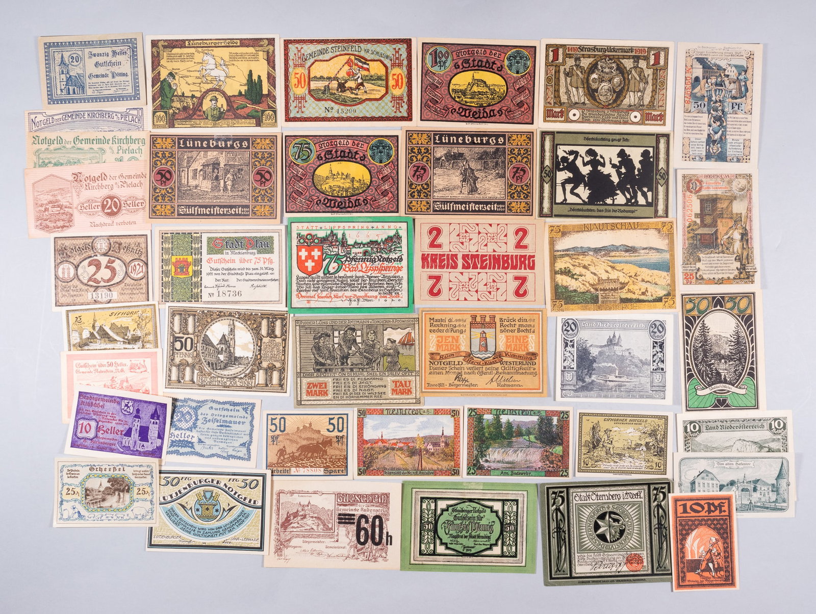 39 COLLECTIBLE GERMAN EMERGENCY NOTGELDS: Thirty-nine Collectible German Emergency Notgelds, collected for their artistic, cultural, and historical value rather than high monetary value. These notes, often produced during the Weimar Republic'