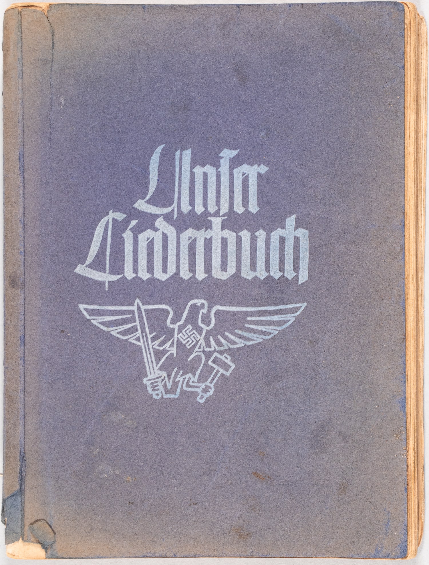 HITLER YOUTH SONGBOOK: WWII German Hitler Youth songbook 'Unser Liederbuch,' publisher Reichsjugendfuhrung, Zentralverlag der NSDAP, Franz Eher Nachf., Munich, 1939. Previous owner's name written on the title page, 'Schmidt