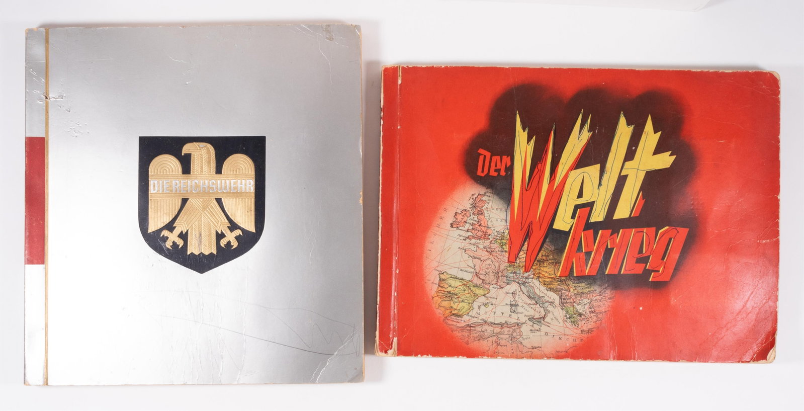 2 NAZI GERMAN CIGARETTE CARD ALBUMS: Two Nazi German cigarette card albums, including: 'Die Reichswehr,' by Haus Neurburg Waldorf-Astoria, 1933, with cigarette cards of the German military, approx. 70 pages, missing many cards, pencil, a