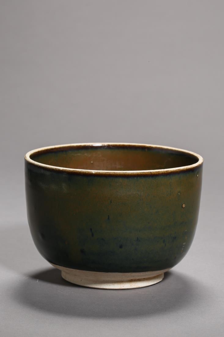 A JIN CIZHOU KILN WARE BLACK GLAZED BUDDHIST BOWL (1 of 11)