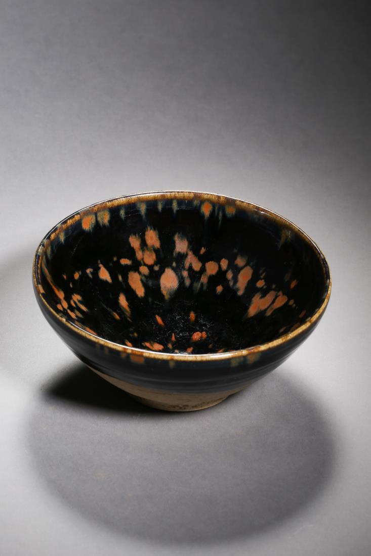 A HALF BLACK GLAZED PORCELAIN BOWL (1 of 11)