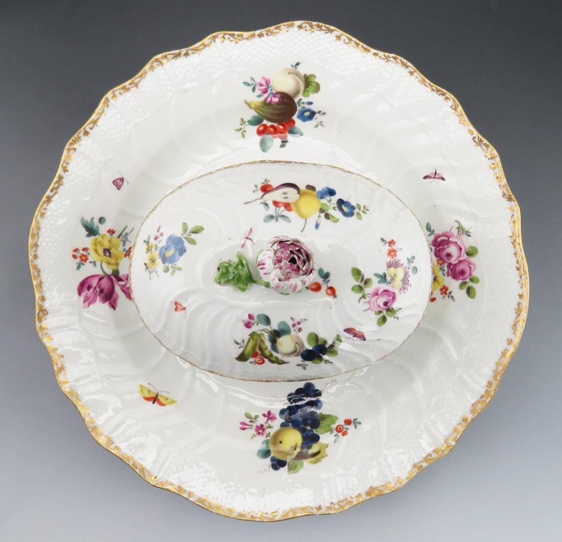 18TH CENTURY MEISSEN GERMAN PORCELAIN SERVING: Antique 18th Century Meissen German porcelain serving platter/Plate attached covered sauce/gravy/vegetable Bowl.Dimension:Platter Diam 24.8 cm, oval bowl L 13.7 cm, W 9.5cm. All measurements are appro