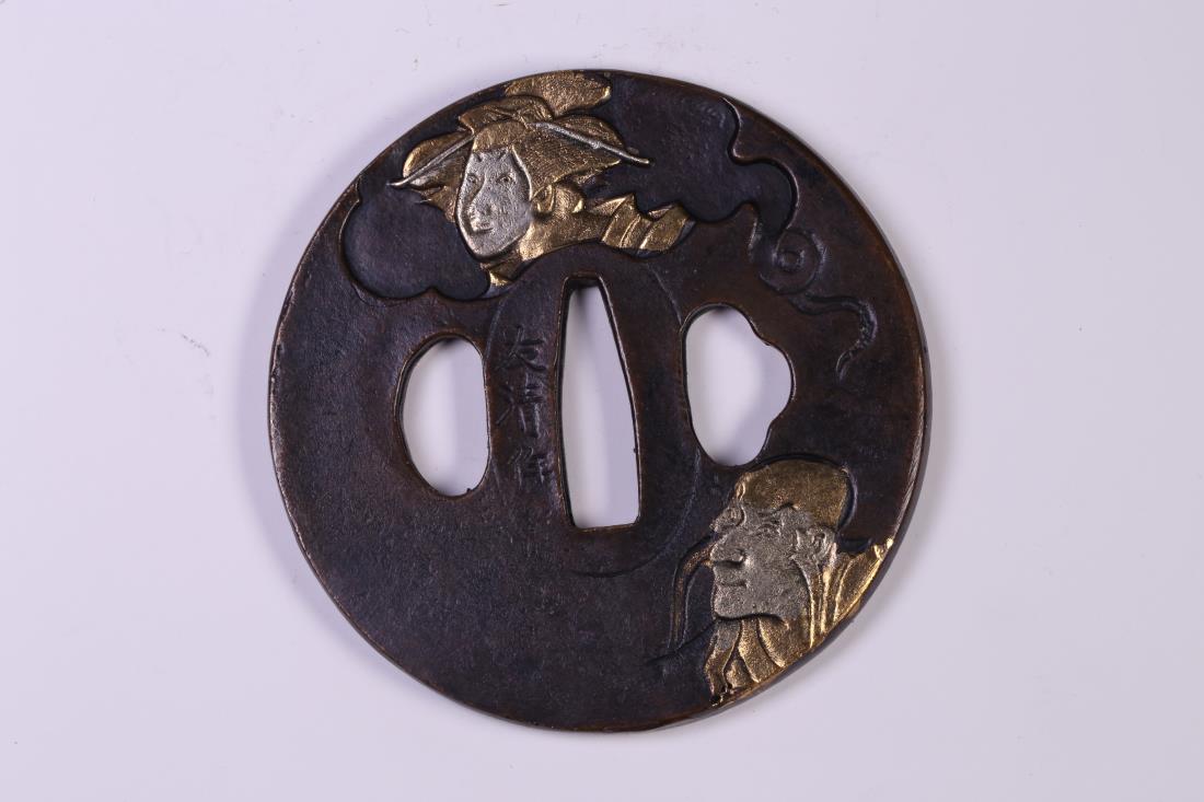 JAPANESE TAISHO PERIOD IRON SWORD HANDGUARD, TSUBA: Japanese Taisho period sword handguard, Tsuba is a round guard at the end of the grip of Japanese sword, it contributes to the balance of the weapon and to the protection of the hand. Dimension: H 0.5