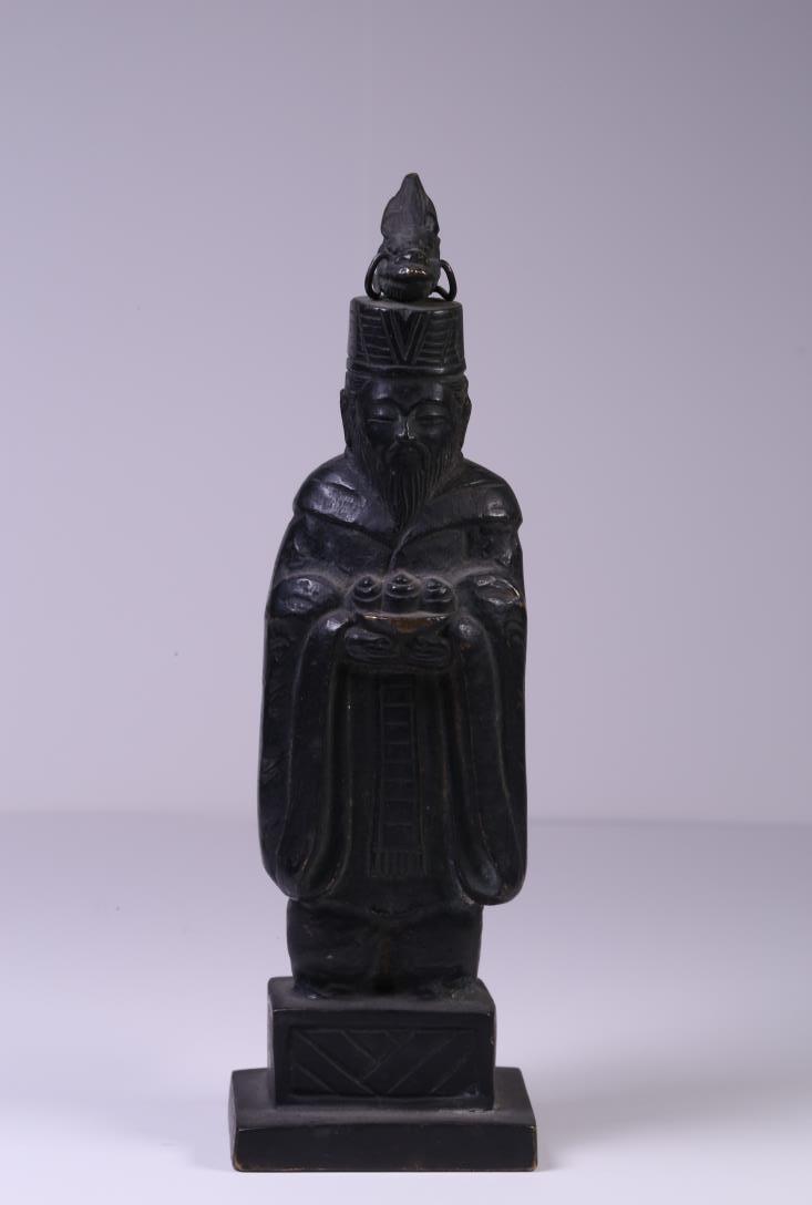 A JAPANESE MEIJI BRONZE FIGURINE WITH DRAGON: A Japanese Meiji bronze figurine with dragon, Japanese Meji era. Dimension: H 16.5 cm, W 5 cm. Weight: 520 g. All measurements are approximate. PROVENANCE: Property from the Collection of Winston Jone