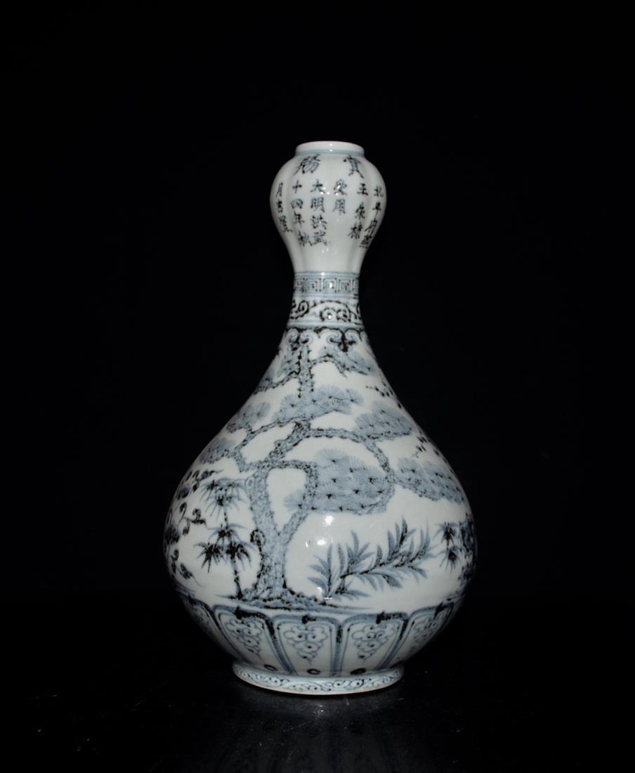 A BLUE AND WHITE 'PINE AND PLUM' GARLIC HEAD VASE: A blue and white 'pine and plum' garlic head vase, Chinese Ming Dynasty Period. Dimension: H 33 cm, Diam 21 cm. All measurements are approximate.