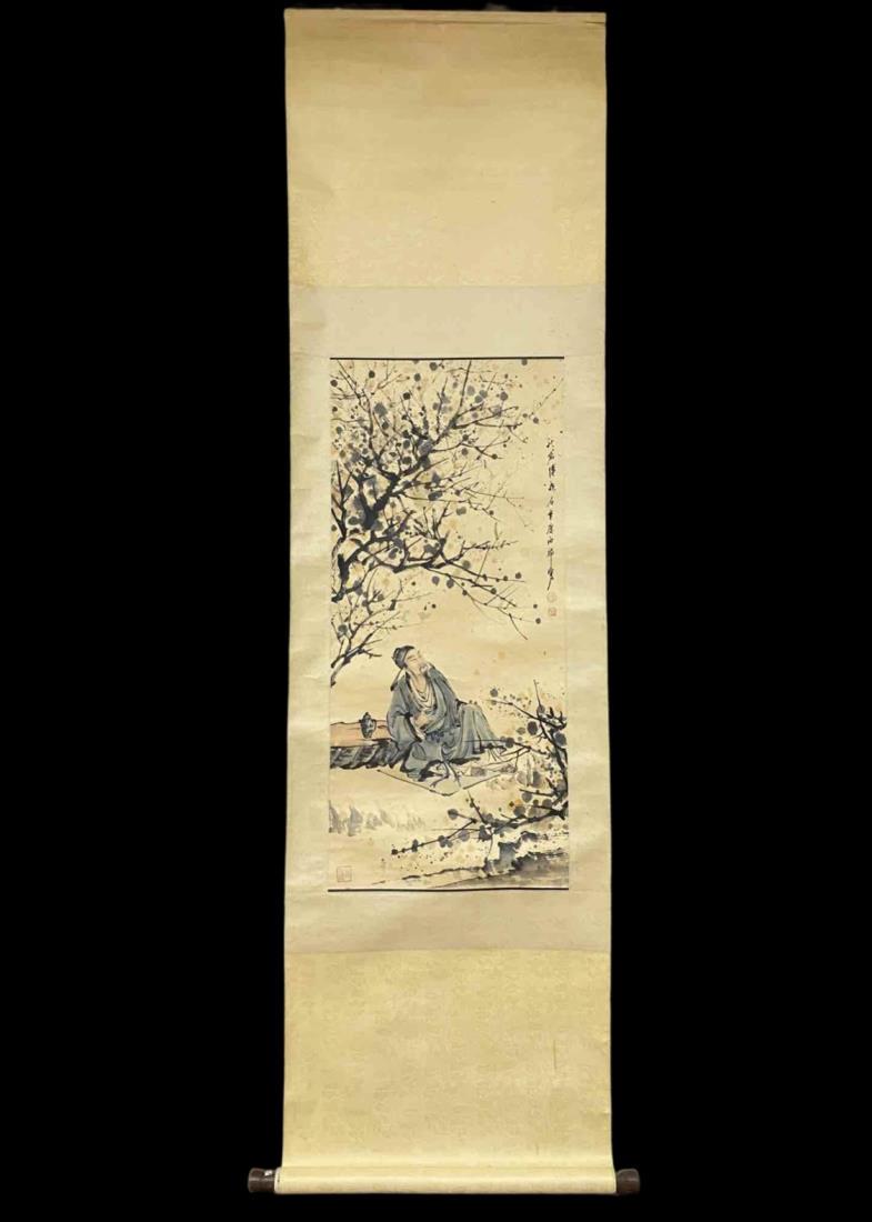 A PAINTING OF POET LI BAI UNDER TREE, FU BAOSHI: A painting of poet Li bai under tree by Fu Baoshi. Ink and color on paper, Hanging Scroll. Artist signature and seals. Dimension: Inner Painting: 96 cm x 43 cm. All measurements are approximate.