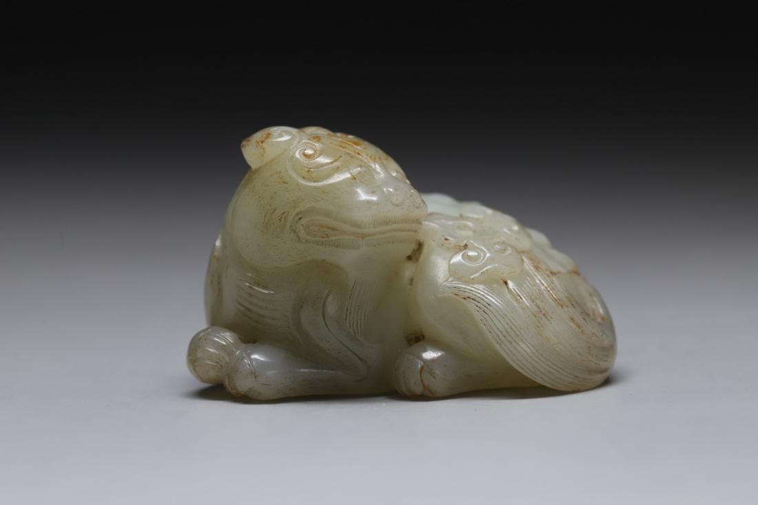 A SEED JADE CARVED 'BEAST AND GANODERMA (1 of 9)