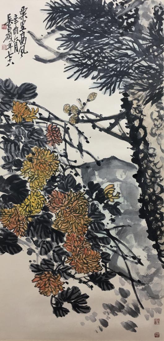 A PAINTING OF CHRYSANTHEMUM AND PINE, WU CHANGSHUO: A painting of chrysanthemum and pine by Wu Changshuo. Ink and color on paper, Hanging Scroll. Artist signature(s) and seal(s). Dimensions: Inner Painting: 138 cm x 67 cm. All measurements are approxim