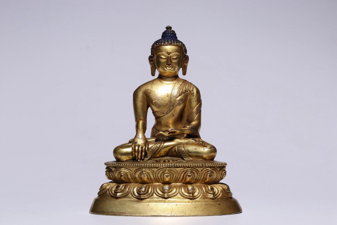 A GILT BRONZE FIGURE STATUE OF SHAKYAMUNI BUDDHA (1 of 9)