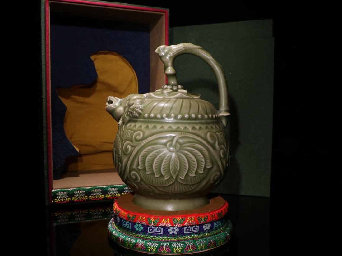 A YUE WARE CELADON-GLAZED PORCELAIN HANDLED TEAPOT (1 of 9)