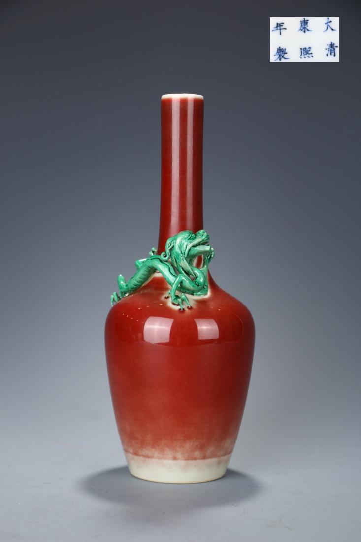 A RED-GLAZED PORCELAIN VASE WITH MODELED DRAGON (1 of 6)