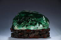 A 'NARRATIVES' RELIEFS JADEITE BOULDER