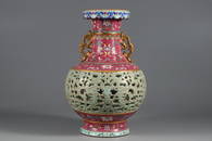 A GILT ENAMEL OPENWORK PORCELAIN VASE