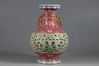 A GILT ENAMEL OPENWORK PORCELAIN VASE