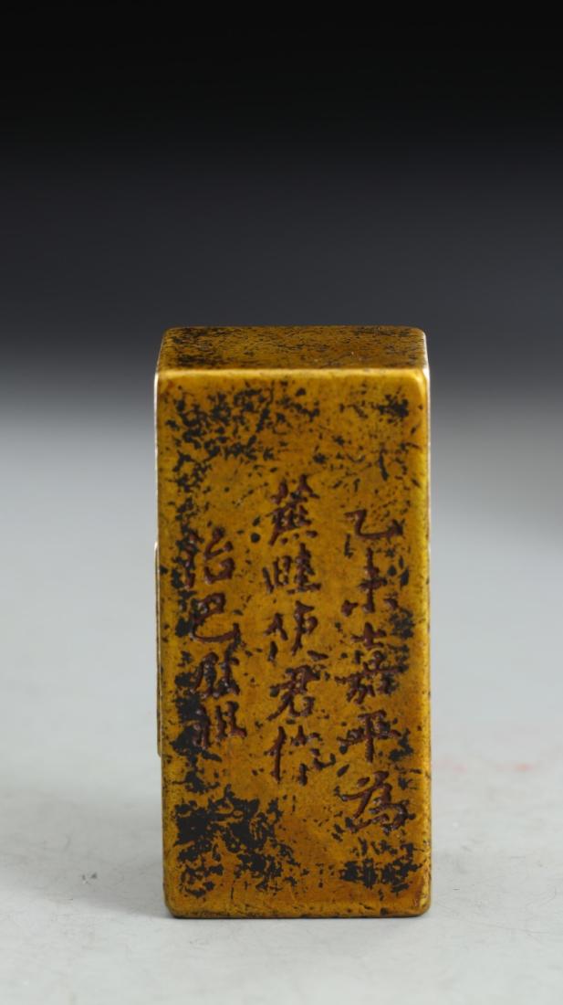 A GILT BRONZE SEAL SET (1 of 9)