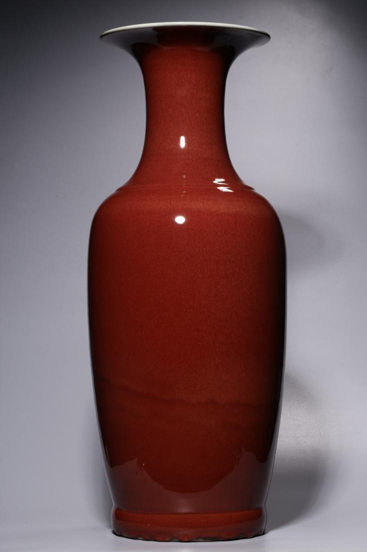 QING, A LARGE RED GLAZED ROULEAU VASE (1 of 9)