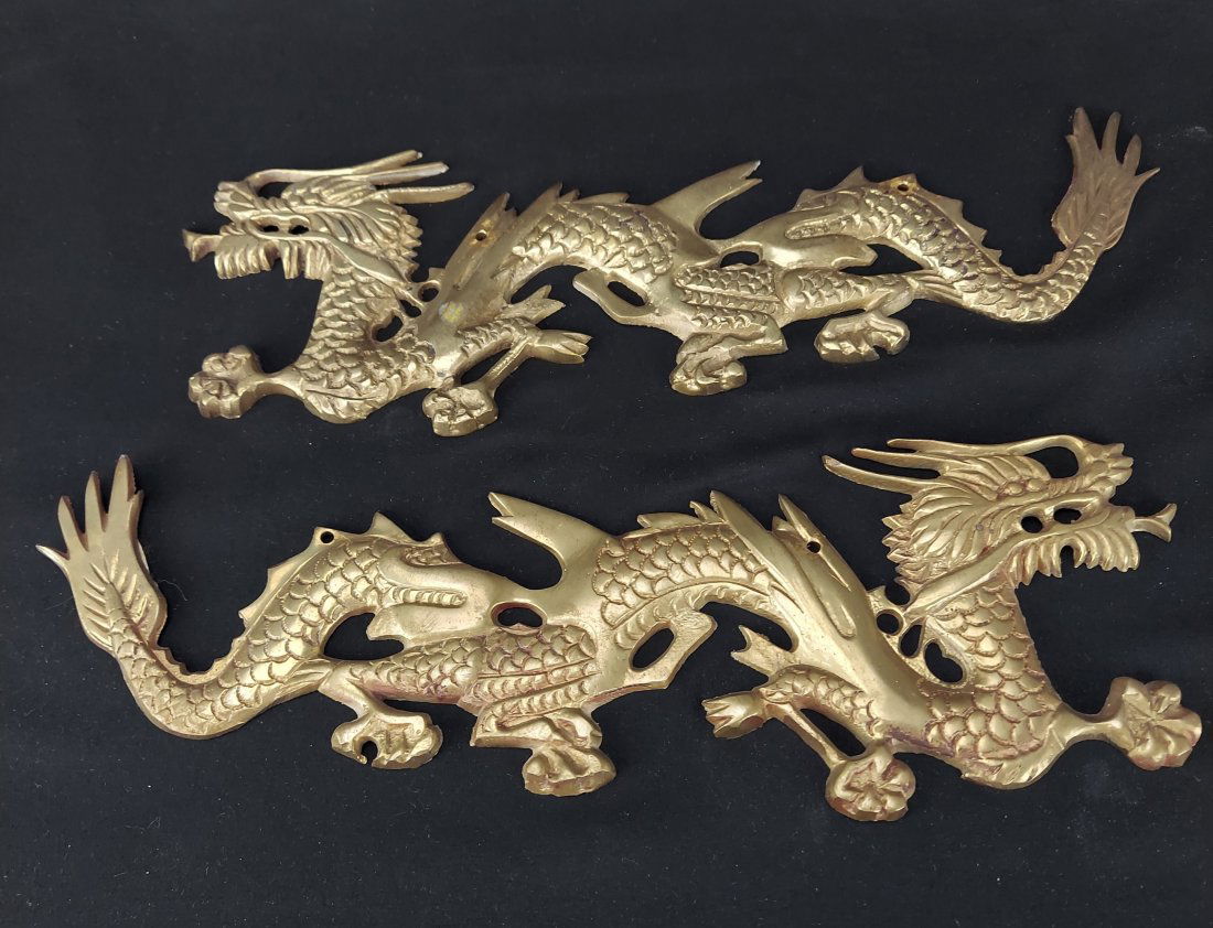 PAIR CHINESE BRASS DRAGONS: PAIR CHINESE BRASS DRAGONS. EACH MEASURES 12 3/4" LONG X 4 1/2" WIDE
