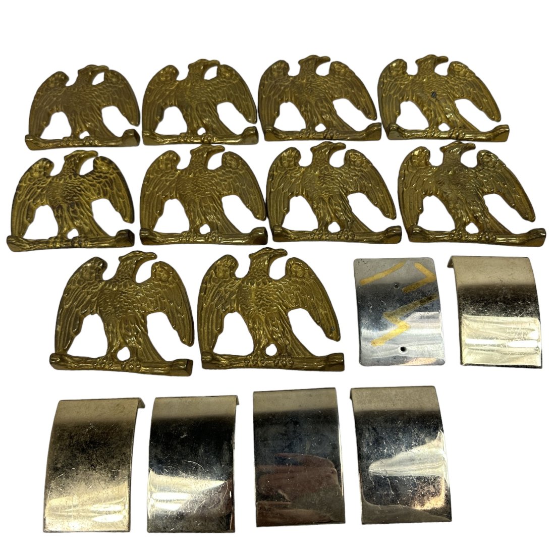 Cast Brass Eagles & Belt Buckle Lot: Lot of vintage cast brass eagles & unidentified buckle plates. Some buckle plates missing clasps.