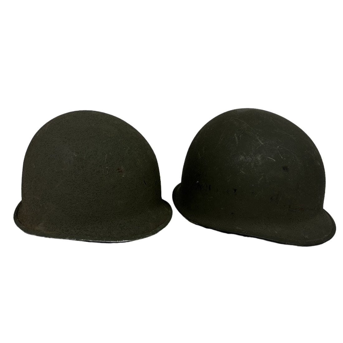 2 WWII Fixed Bale US M1 Helmet Shell Lot: Lot of 2 WWII fixed bale US M1 helmet shells.
