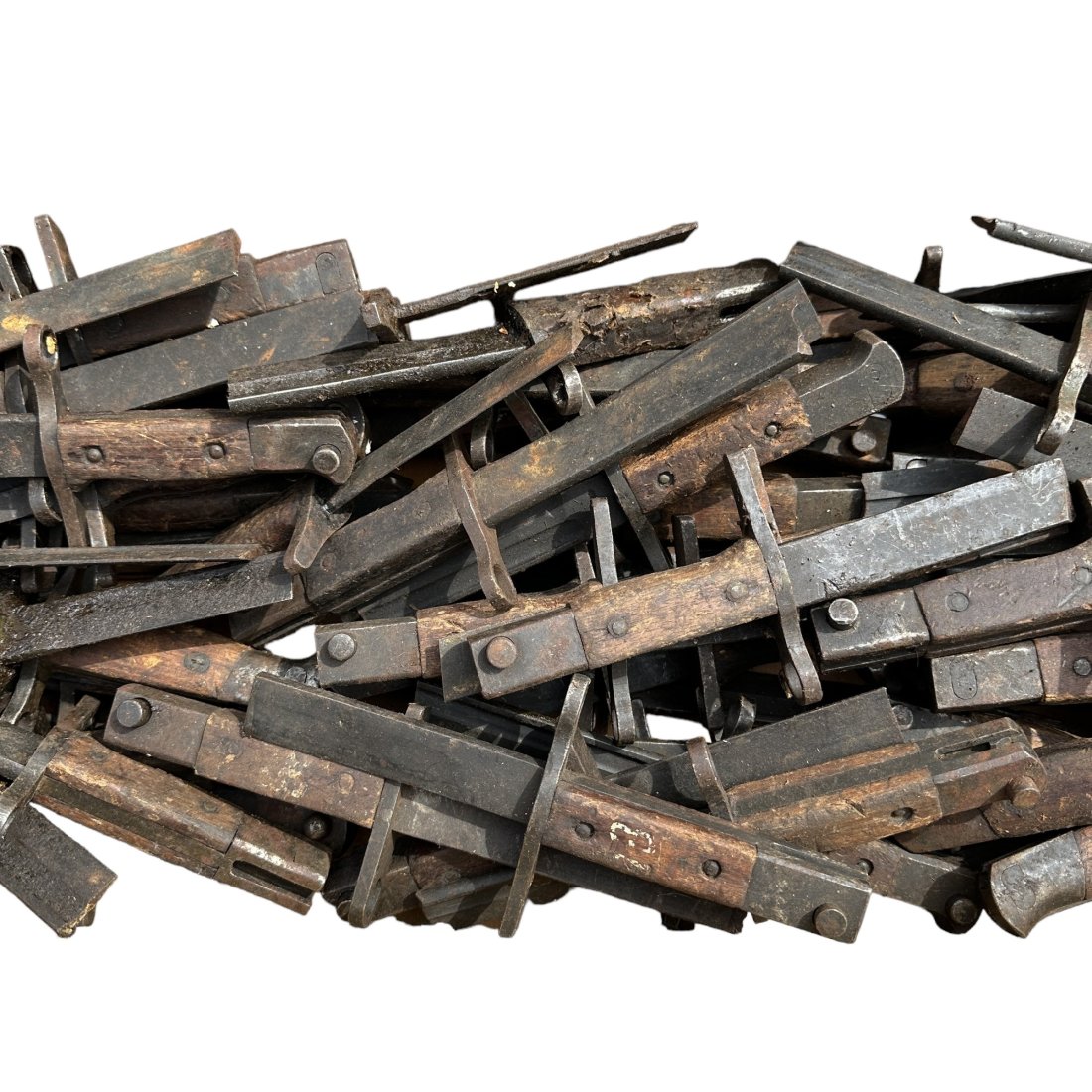 ~80 WWII Japanese Bayonets w/ Cut Blades: Lot of approximately 80 WWII Japanese bayonets with shortened blades. Very greasy with some rust. In wood shipping crate. Very heavy.