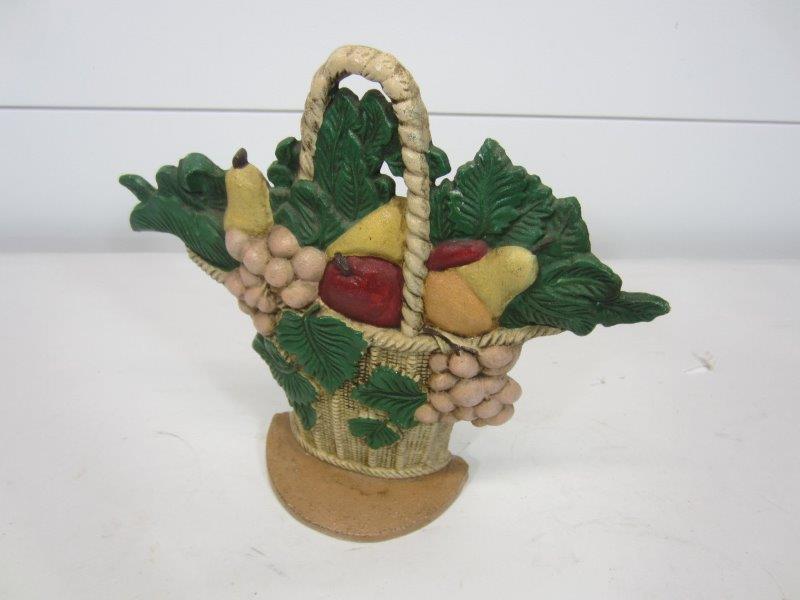 VINTAGE CAST IRON FRUIT BASKET DOOR STOP: 9" X 9 3/4" This item is available for shipping. It is the bidder's responsibility to take shipping costs into consideration when bidding. We charge the actual cost of your label plus a $10 handling f