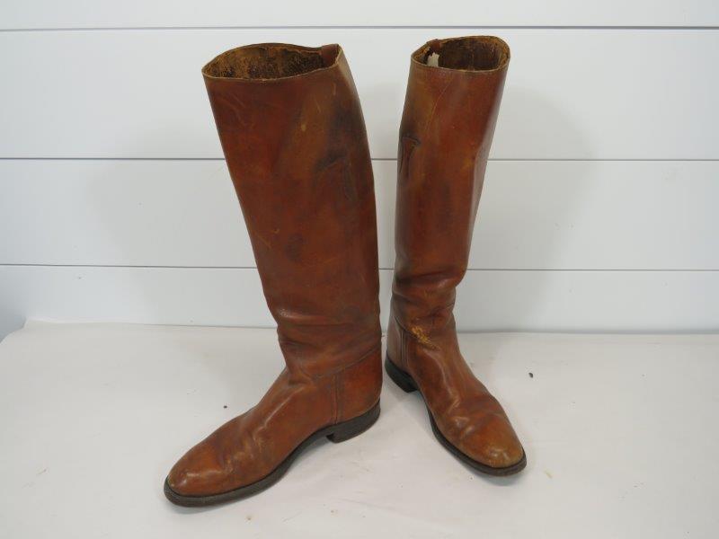PAIR OF EARLY LEATHER RIDING BOOTS MADE IN ENGLAND: SZE 8 W. SHOWS SOME WEAR W/ SOME SEAM SEPARATION AT THE TOP. HEEL TO TOE 11. SHAFT 17" This item is available for shipping. It is the bidder's responsibility to take shipping cos