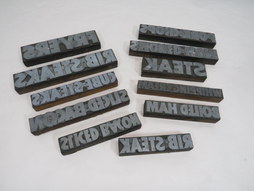 Grocery Market Printers Stamps: Lot of eleven vintage stamps. Stamps included are Steak, Rib Steak, Cube Steak, Boiled Ham, Smoked Ham, Fryers, 2-Sliced Bacon, Whipping Cream, Rib Steak, Pork Chops. Sizes range from 5 1/