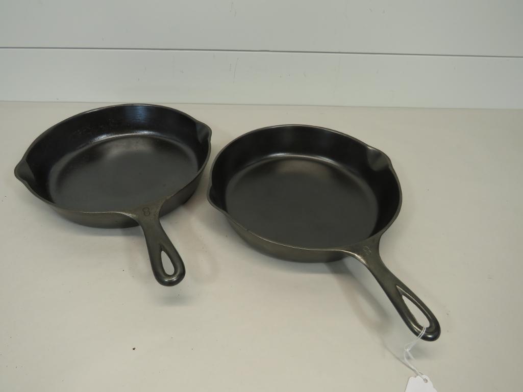 Wagner Ware No. 8 Skillets: Lot of two cast iron skillets. One has pitting the other one is fine.
