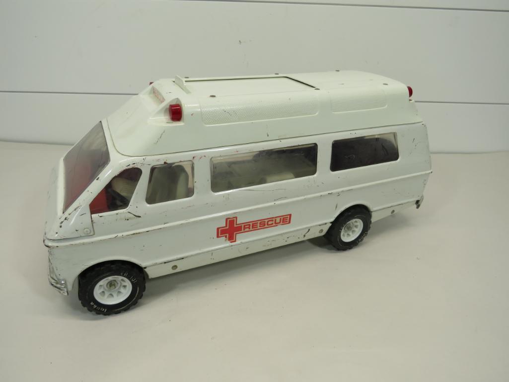 Tonka Rescue Ambulance: Side door does not want to move easily. Back window is missing and back door does not latch. Gurney is present. 19" L x 8" H x 7" W