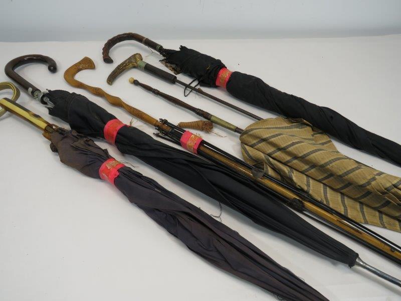 Six Umbrellas & Parasols: For restoration, as all are in worn condition. The folding parasol has a broken end. 