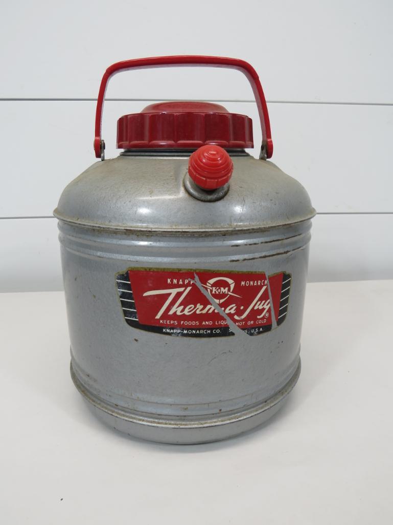 Therm-a-Jug Drink Cooler: With original label. 12 1/2" H to top of handle and 9 3/4" W