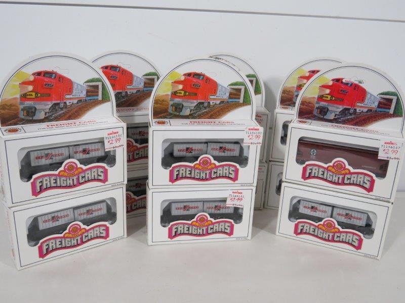 Bachmann N Scale Train Freight Cars (12): This lot includes twelve Bachmann N Scale Train cars, all in original packaging. Included are eleven Sea Land and one Santa Fe. Size Range - 4" L to 5" L 