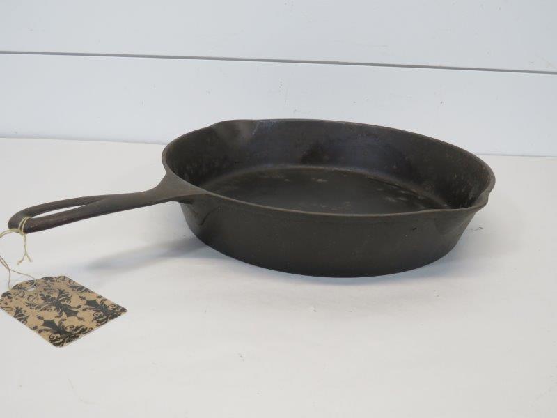 Erie Cast Iron #9 Skillet with Fire Ring: Showing pitting as seen in photos. Does sit flush. 12" D from drip outlet to drip outlet. 