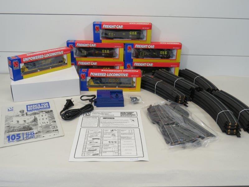 NIB Bachmann HO Power-Loc & "CSX" Freight Train Set: This is a complete set including the powered locomotive, unpowered locomotive, freight cars, track, components and all paperwork. Believed to be in in good working condition as it is new and has never