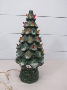 Vintage Flocked Ceramic Christmas Tree: Good working condition, missing a few bulbs.&nbsp; 17 1/2" H x 7" W