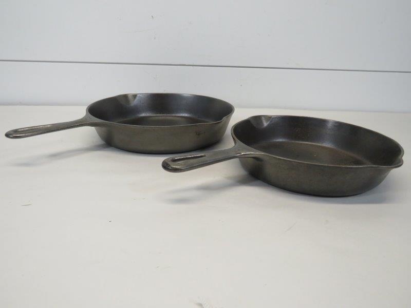 Griswold Large Logo No. 8 & Small Logo No. 6 Cast Iron: No. 8: Marked 704 S. Shows one spot of rust and sits flush. 10 1/2" No. 6: Marked 699. Sits flush. 9" 