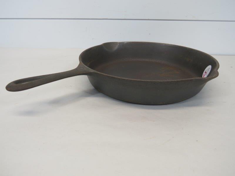 Griswold Large Logo No. 9 Cast Iron Skillet: Erie PA 710 J, sits flush. Showing pitting as seen in photos. 11" 