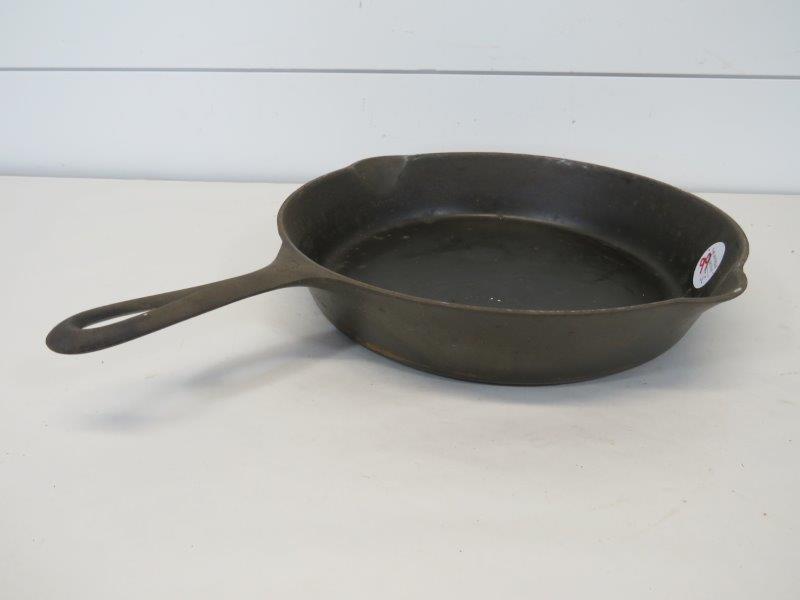 Griswold Large Logo No. 9 Cast Iron Skillet: Marked: Erie PA,. U.S.A. 710 F With some rusting beginning. Sits flush. 11 1/4" 