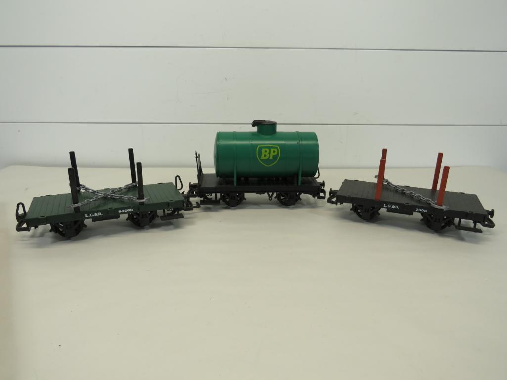 LGB G Scale Freight Cars (3): Out of box. One trailer car appears to be missing one tie-down chain. 10" L 