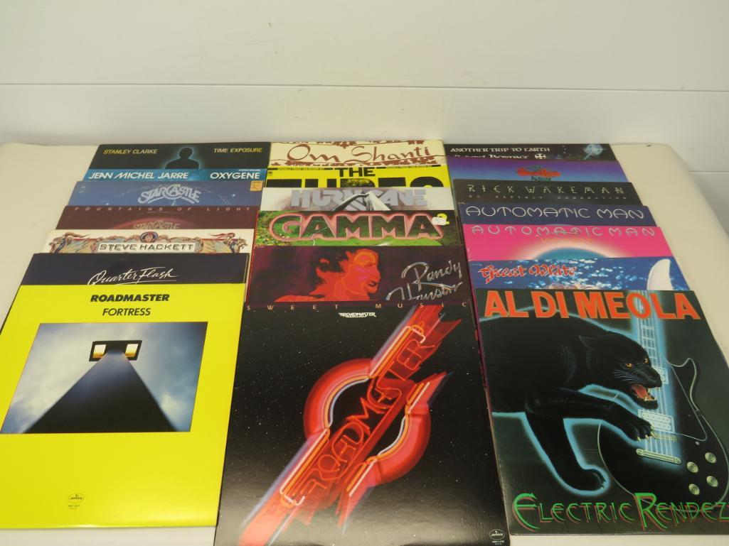 Large Lot of Vintage Vinyl Albums (20): All albums play well and are in original sleeves with no chips, cracks or breaks. Artists included - Quarter Flash Roadmaster Al Di Meola Randy Hansen Gamma Great White Hurricane Automatic Man