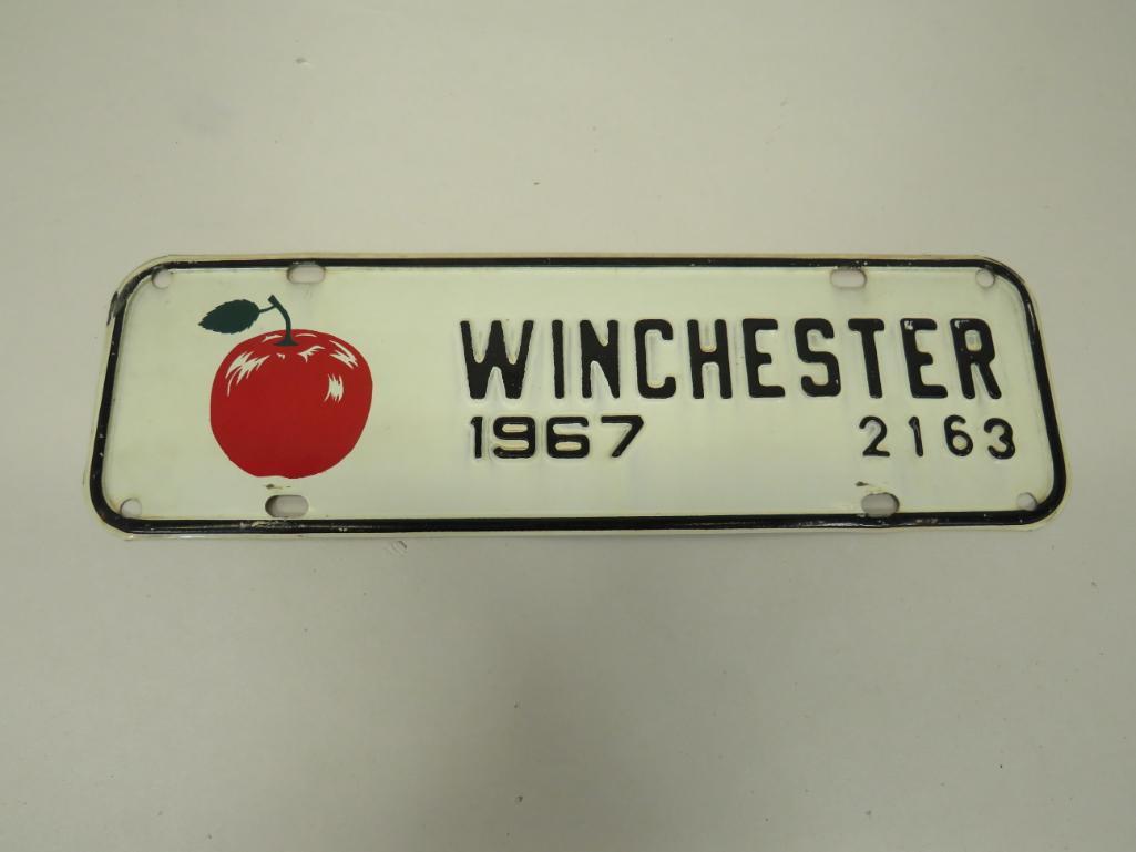 Virginia Winchester City License Plate Topper 1967: Some rusting around edges with very slight denting around edges as well as a manufacturer paint flaw at top left as shown in photos. 3 3/4" x 12"