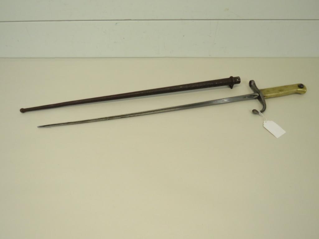 Bayonet & Scabbard: This item is shippable. We offer combined shipping in-house. Dimensions: 25 3/4" L Hilt stamped with 873. Brass handle. Blade is oiled, some pitting to the sheath. Photos will serve to represent a