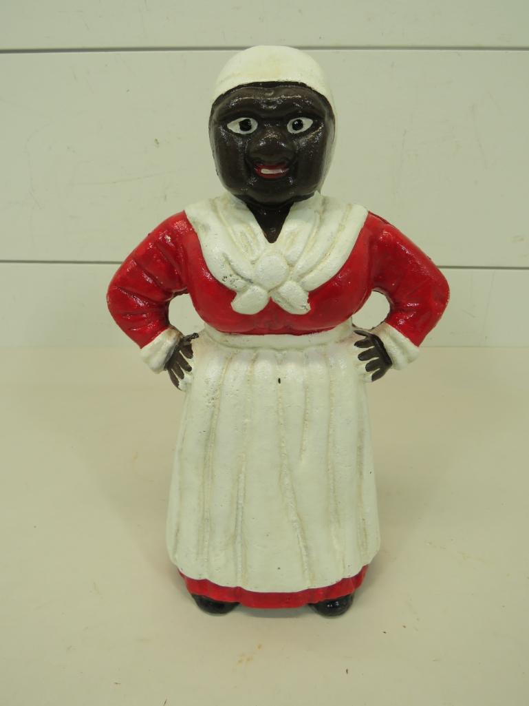 Mammy Black Americana Cast Iron Bank: This item is shippable. We offer combined shipping in-house. Dimensions: 10" H x 6 1/2" W x 4" D Age unknown. Photos will serve to represent any other condition issues. Condition reports w