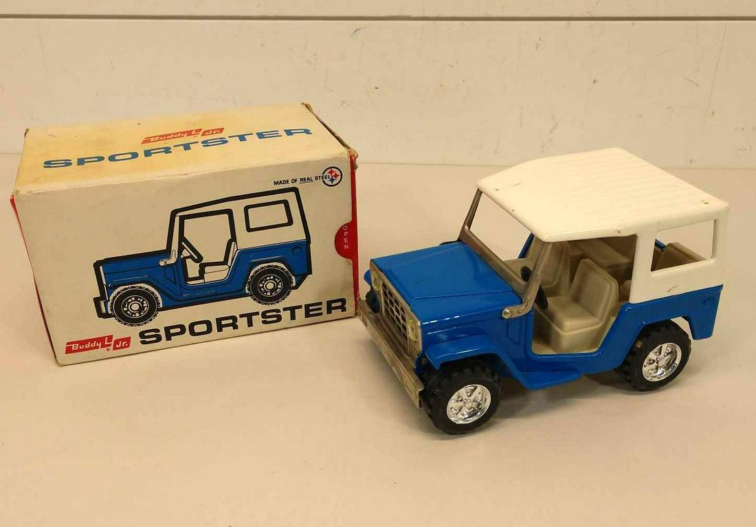 Buddy L Jr Sportster Blue Jeep with Original Box: This item is shippable. We offer combined shipping in-house. Dimensions: 6" L x 3 3/4" D x 3 1/2" H Car has a few minor spots that should clean off and box has some yellowing. Photos will 