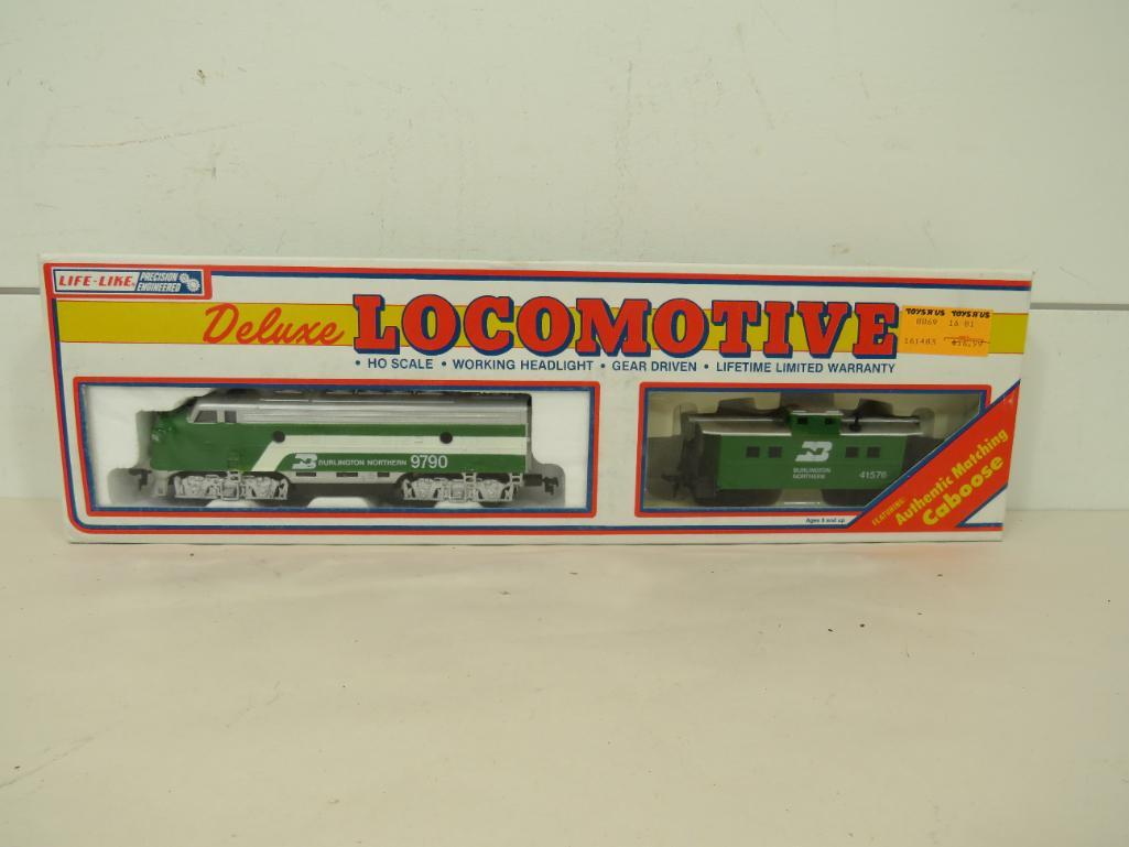 Life-Like HO Scale F-7 Diesel Locomotive & Caboose: This item is shippable. We offer combined shipping in-house. Dimensions: 6 1/2" and 4" Runs good forward and reverse. Operating headlight. Photos will serve to represent any other condition is